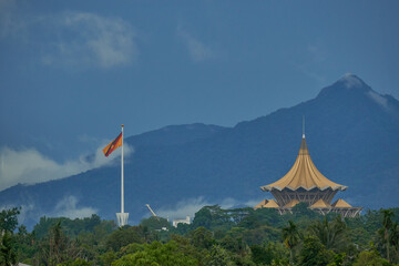 Sarawak's new flagpole near the Sarawak State Legislative assembly building with Mount Serapi on the background.