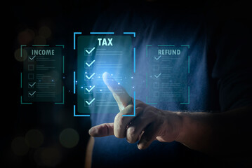 E-tax, Man pointing to tax icon for Individual income tax return form online for tax payment concept. pay online income tax. futuristic virtual screen interface technology.