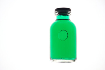 Medical medicine bottles with green liquid with syringe friendly plastic cap Thailand Asia