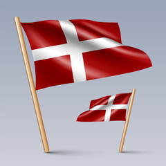Vector illustration of two 3D-style flag icons of Denmark isolated on light background. Created using gradient meshes, EPS 10 vector design elements from world collection