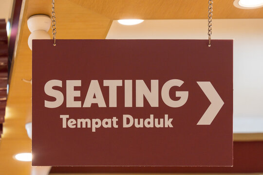 Close-up view of the seating direction signboard.