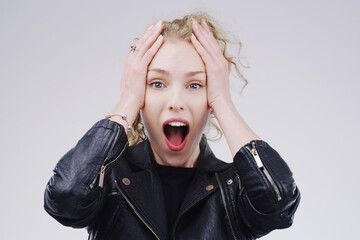 Shocked, wow and woman in studio portrait, announcement and surprised with news for deal. Emoji,...