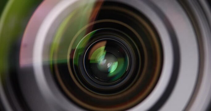 Close-Up of Camera Lens with Colorful Reflections