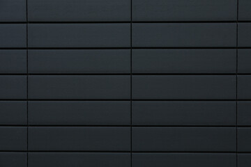 Black wall of a modern house in the city