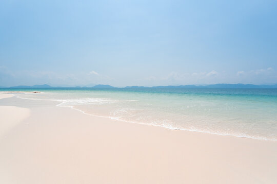 Beautiful sandy beach and sea water and waves in southern Thailand, Asia