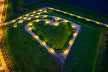 Bison bastion, 17th-century fortifications of Gdańsk illuminated at night in the heart shape....