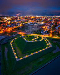 Bison bastion, 17th-century fortifications of Gdańsk illuminated at night. Poland