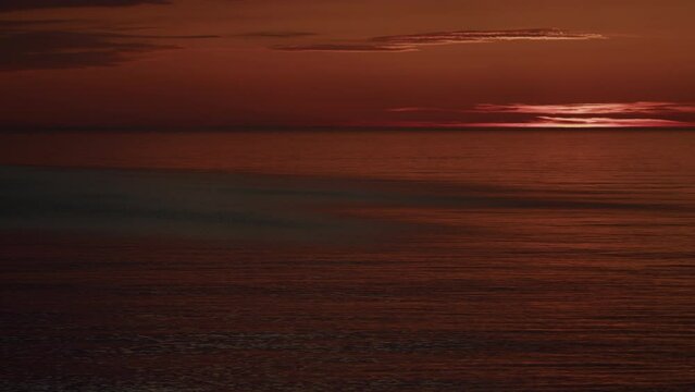 Sunset Over Water. Sunset Over Sea Horizon. Big Sun And Sea Sunset Background.