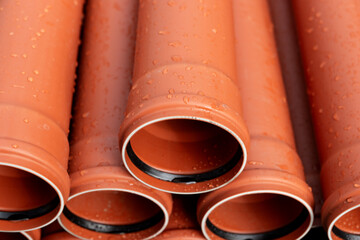 Plastic drain pipes on a construction site
