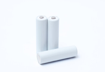 White blank aa batteries on a white background. Mockup for design