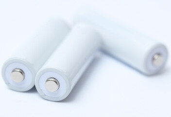 White blank aa batteries on a white background. Mockup for design