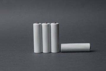 AA batteries on a dark gray background. Mockup for design