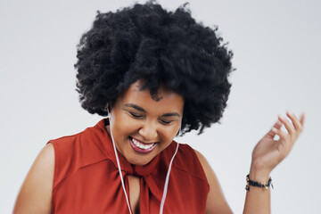 Laughing, dance or happy black woman in music headphones in studio for singing on grey background....