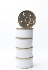 Tin cans of canned food with white labels on white background, mockup for your design
