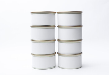 Tin cans of canned food with white labels on white background, mockup for your design