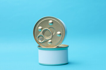 Tin cans of canned food with white labels on blue background, mockup for your design