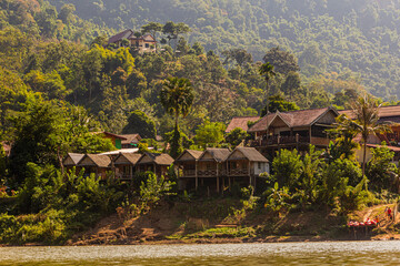 Houses in Nong Khiaw viewed from Nam Ou river, Laos