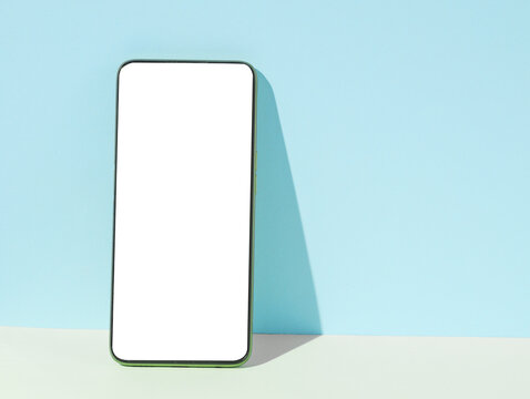 Smartphone mockup with white blank screen on pastel background