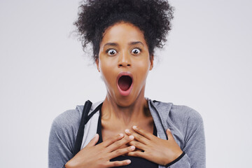 Shocked, wow and black woman in studio portrait, announcement and surprised with news for deal....