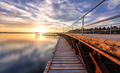Naklejka premium Pier at sunset