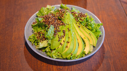 Avocado Kinoa Salad Healty Meal Served at Wooden Table