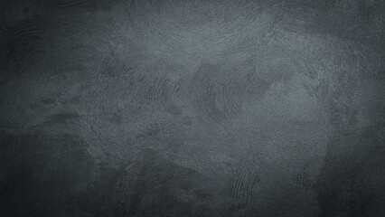 Black stone background, concrete dark surface or wall. Free space for design or text.