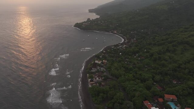 Aerial view of Amed Beach with Agung volcano, Bali, Indonesia.