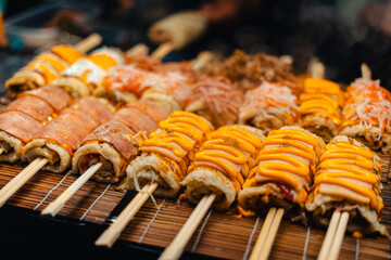 Japanese rice rolls on skewers, street food