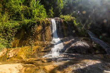 Naklejka na ściany i meble Waterfall near Donkhoun (Done Khoun) village near Nong Khiaw, Laos