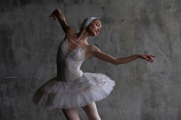 Bballerina performs the part of a white swan.