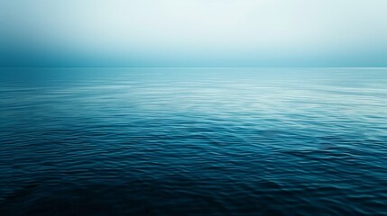 Tranquil Blue Ocean Water With Hazy Fog, Perfect for Relaxation and Travel Brochures - obrazy, fototapety, plakaty