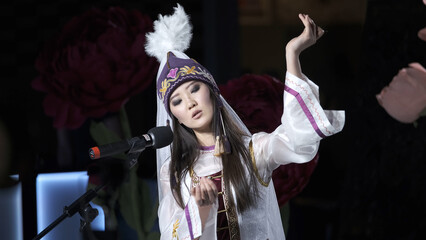 Female defile korean person jews-harp korea. Beautiful asian girl folk costume khomus traditions...