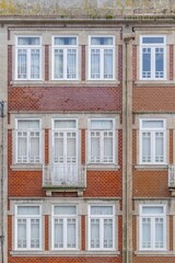 Old and deteriorated facade typical of the buildings of the beautiful city of Porto, travel and monuments of Portugal. Next to the Douro river.