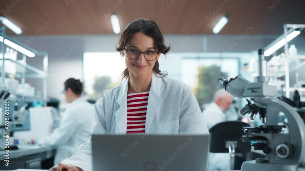 Poster medical research scientist looking at biological samples under a microscope in an applied science la