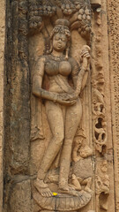 Fototapeta na wymiar Carving Sculpture of Madnika on the Entrance of Shri Pataleshwar Temple, 12th Century Lord Shiva Temple, Malhar, Chhattisgarhm India.