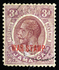 Ukraine, Kiyiv - February 3, 2024.postage stamp depicting portrait of King George V 1900.He was King of the United Kingdom. Jamaica is an island country situated in the Caribbean Sea. Philately. - obrazy, fototapety, plakaty