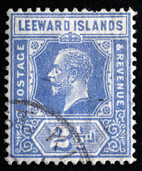 Ukraine, Kiyiv - February 3, 2024.Postage stamps from LEEWARD ISLANDS.A stamp printed in the LEEWARD ISLANDS shows King Edward VII , circa 1902 - obrazy, fototapety, plakaty