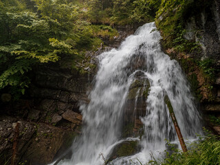 Berchtesgaden Schrainbachfall waterfall with surrounding green forest landscape