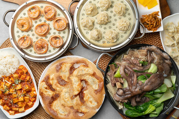 Korean food, shrimp, meat, dumplings, kimchi, xiaolongbao, mapa tofu rice, ribs, octopus, hot pot, side dishes, pickled radish