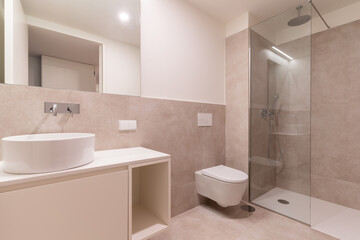 Fototapeta na wymiar Interior photo of the modern stylish bathroom in light beige colors