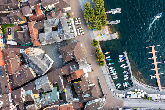 Ascona, Switzerland: Aerial overhead view of Ascona town and marina famous by lake Maggiore with the promenade lined by restaurant in canton Ticino in Switzerland