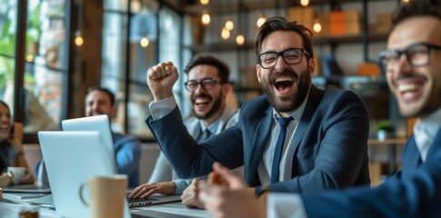Business team brainstorming ideas during a meeting with hands raised at conference table