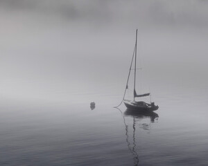 sailboat in the fog