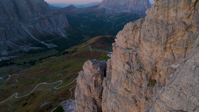 Aerial view of Dolomites, Pizes de Cir at sunset with mountain peak, Italy.