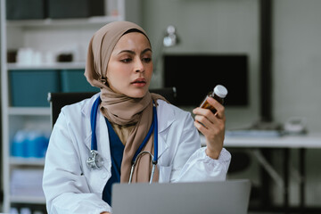 Caring pharmacist conducts video consultation, communicates with patient via an online conference,...