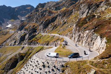 Sunsten Pass, Switzerland: Cars and motorcycle drives onf the Susten pass mountain between the cantons of Bern and Uri in the alps in summer in Switzerland - obrazy, fototapety, plakaty