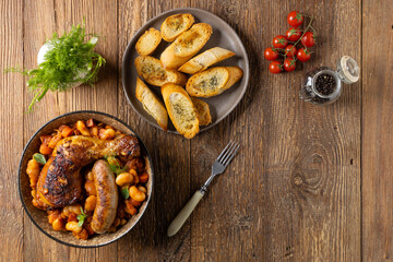 A traditional French one-pot dish with beans, chicken and white sausage. Cassoulet. - 788207598