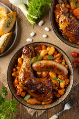 A traditional French one-pot dish with beans, chicken and white sausage. Cassoulet. - 788207938