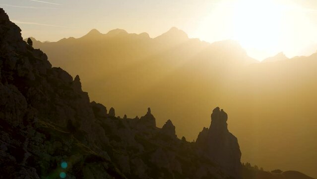 Aerial view of Dolomites at sunset with Pizes de Cir, Trentino, Italy.