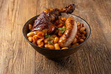 A traditional French one-pot dish with beans, chicken and white sausage. Cassoulet. - 788208115